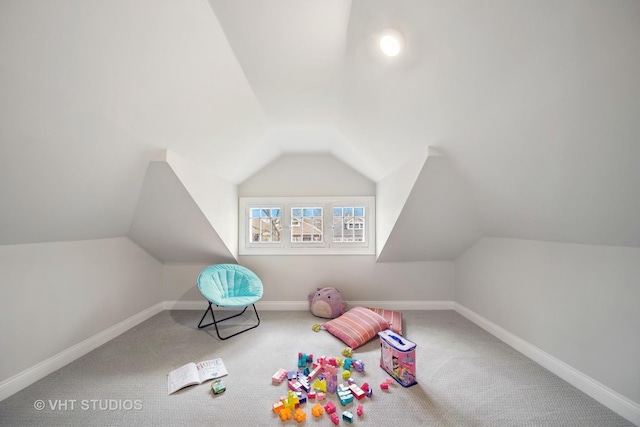 playroom with baseboards, carpet, and lofted ceiling