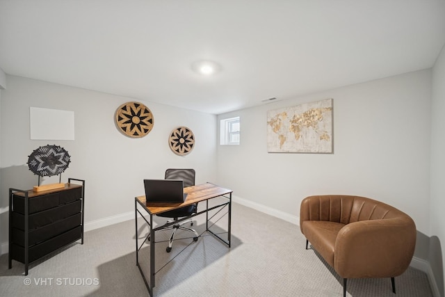office area with baseboards and light colored carpet