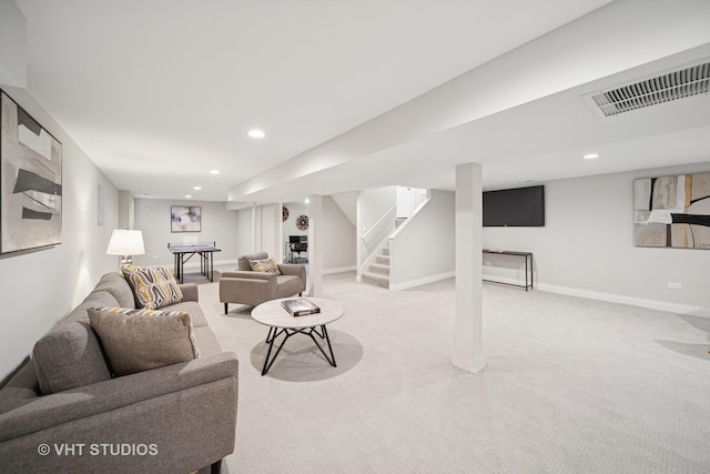 living room with light colored carpet, visible vents, stairs, baseboards, and recessed lighting
