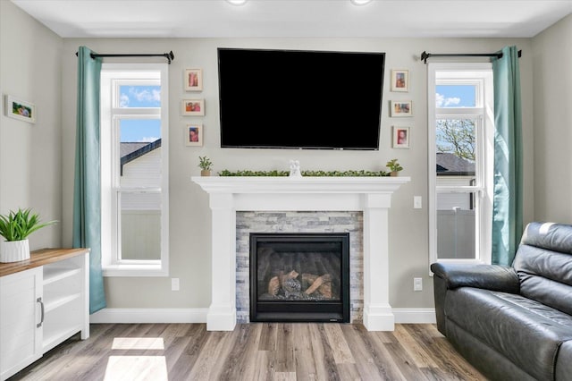 715 Cole Ln, Mahomet, IL 61853 - living area with baseboards, a fireplace, recessed lighting, and wood finished floors