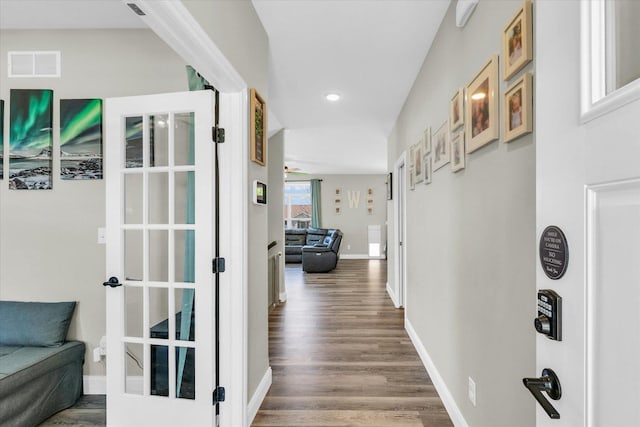 715 Cole Ln, Mahomet, IL 61853 - corridor featuring visible vents, wood finished floors, baseboards, and recessed lighting