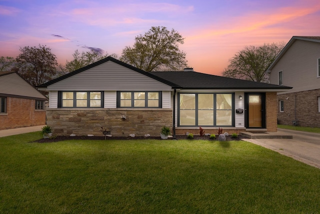439 N Highview Ave, Elmhurst, IL 60126 - view of front facade featuring a lawn, a chimney, and stone siding