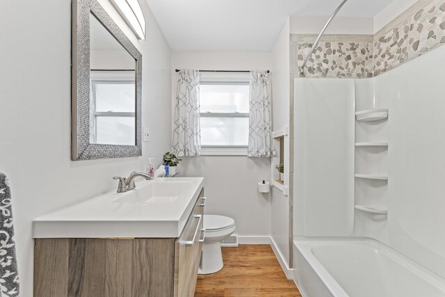 439 N Highview Ave, Elmhurst, IL 60126 - bathroom with vanity, toilet, baseboards, wood finished floors, and visible vents