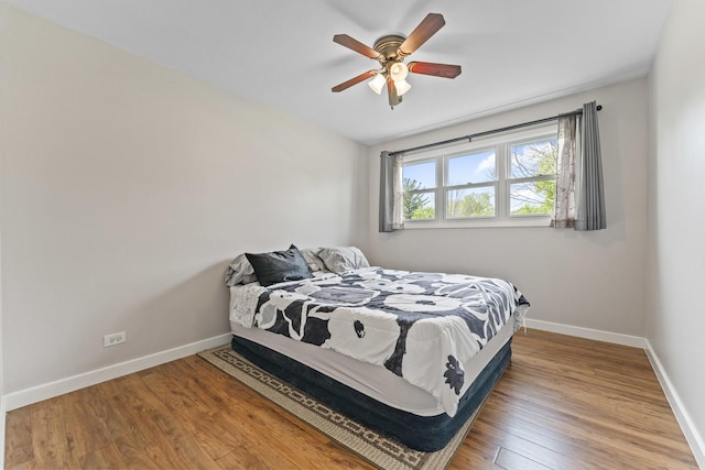439 N Highview Ave, Elmhurst, IL 60126 - bedroom with baseboards, ceiling fan, and wood finished floors