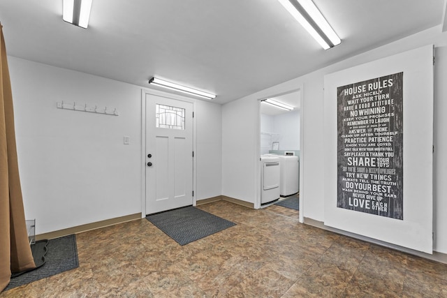 439 N Highview Ave, Elmhurst, IL 60126 - foyer entrance featuring stone finish floor, baseboards, and independent washer and dryer