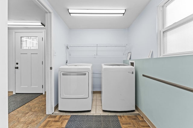 439 N Highview Ave, Elmhurst, IL 60126 - laundry room featuring plenty of natural light, laundry area, baseboards, and washer and dryer