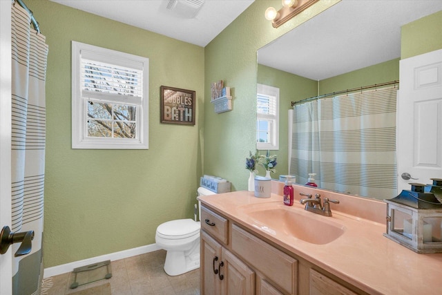 bathroom with toilet, baseboards, visible vents, a textured wall, and vanity
