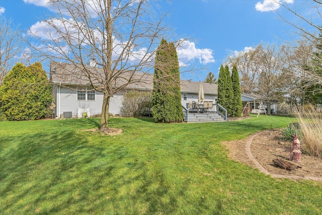 view of yard with a wooden deck
