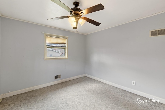 511 N Cleveland Ave, Bradley, IL 60915 - empty room with baseboards, a ceiling fan, crown molding, and visible vents