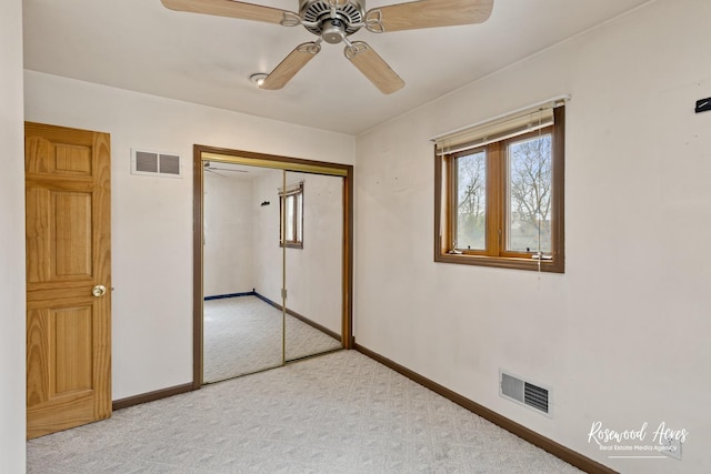 511 N Cleveland Ave, Bradley, IL 60915 - unfurnished bedroom featuring a closet, visible vents, carpet flooring, and baseboards