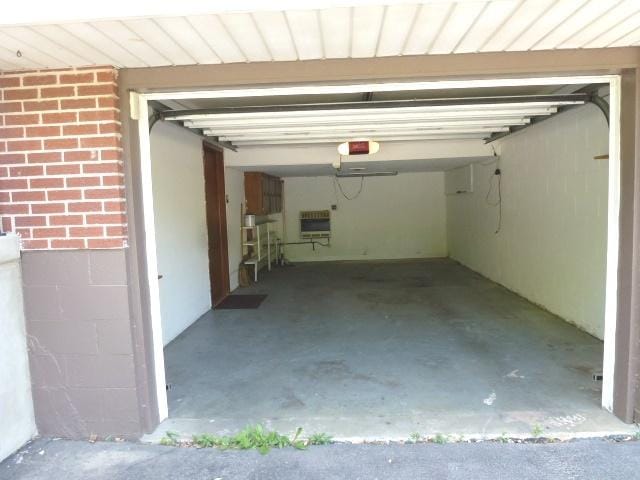 1026 State Route 10 E, Clinton, IL 61727 - garage with heating unit and a garage door opener