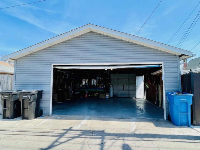 detached garage with fence