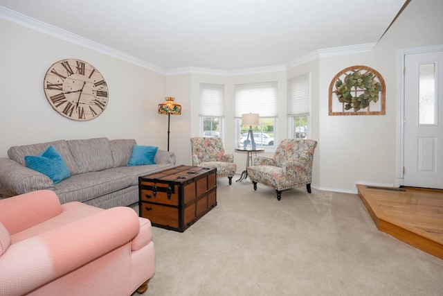 living room featuring light carpet, ornamental molding, and baseboards