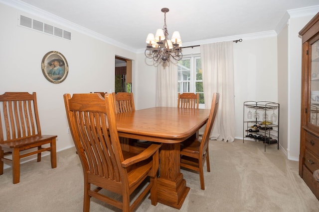 dining area with light carpet, crown molding, an inviting chandelier, and visible vents
