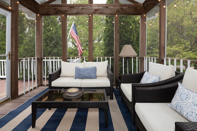 sunroom / solarium with an outdoor living space