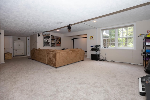 living room with carpet, recessed lighting, and a textured ceiling