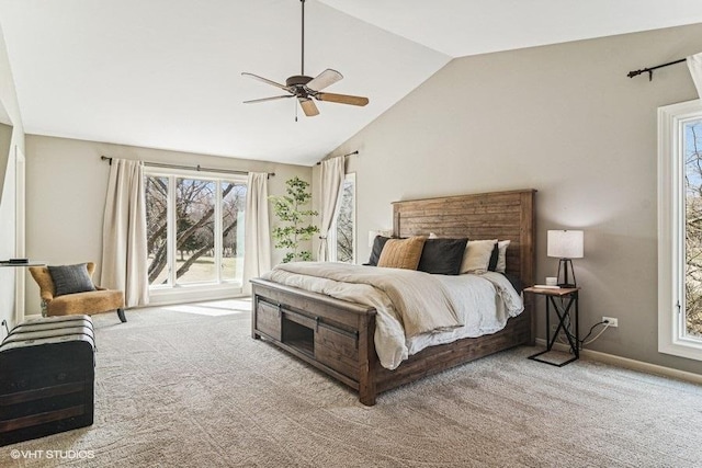 carpeted bedroom with baseboards, ceiling fan, vaulted ceiling, and access to exterior