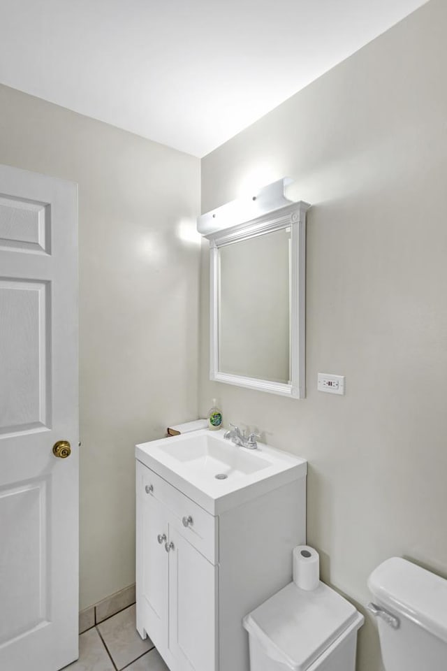 680 Marilyn Ave Unit 201, Glendale Heights, IL 60139 - bathroom with toilet, vanity, and tile patterned flooring