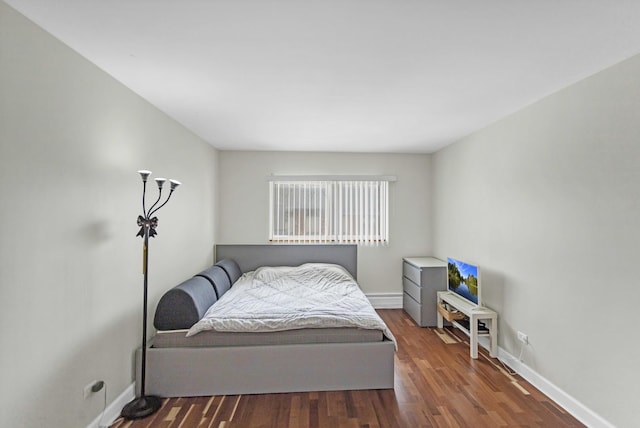 680 Marilyn Ave Unit 201, Glendale Heights, IL 60139 - bedroom with wood finished floors and baseboards
