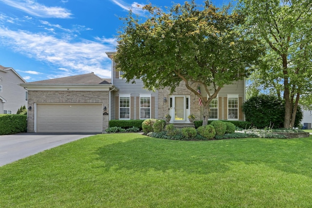 7817 Cascade Way, Gurnee, IL 60031 - view of front facade featuring an attached garage, a front lawn, and driveway