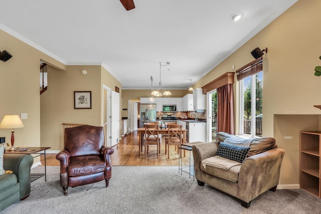 7817 Cascade Way, Gurnee, IL 60031 - living area featuring ornamental molding, light wood-style floors, and light carpet