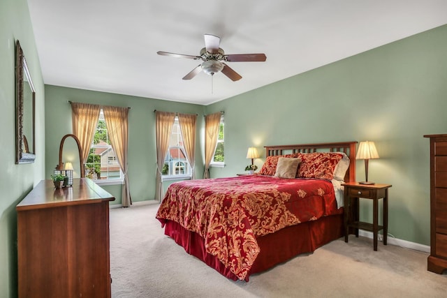 7817 Cascade Way, Gurnee, IL 60031 - bedroom with light colored carpet and ceiling fan