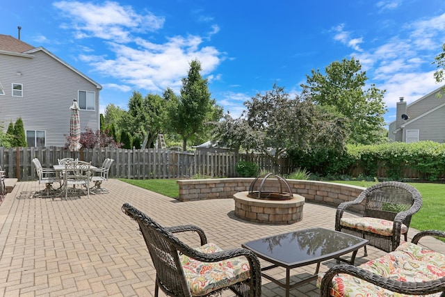 7817 Cascade Way, Gurnee, IL 60031 - fenced backyard with an outdoor fire pit, a patio area, and outdoor dining area