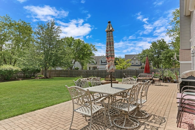 7817 Cascade Way, Gurnee, IL 60031 - fenced backyard featuring outdoor dining space and a patio