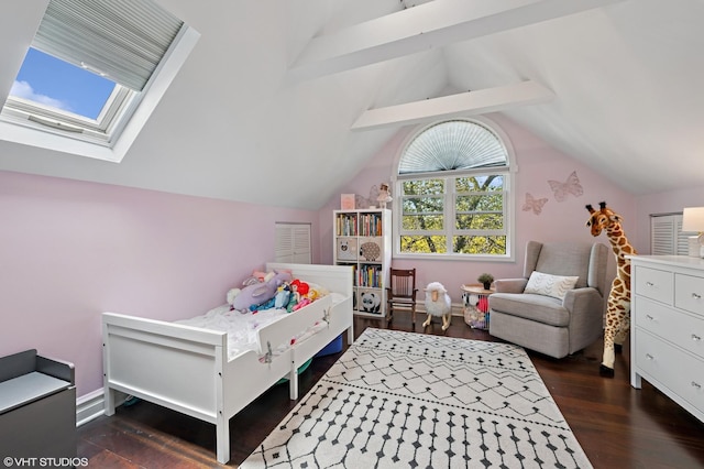 3311 N Hamilton Ave, Chicago, IL 60618 - bedroom featuring dark wood-style flooring and vaulted ceiling with skylight