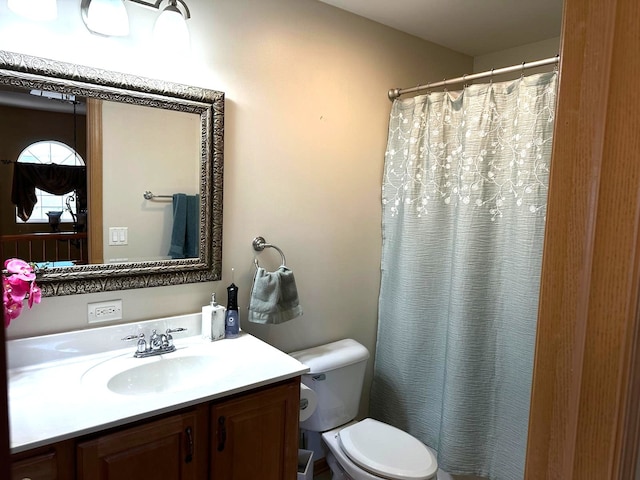 2115 Stafford Ct, Plainfield, IL 60586 - full bathroom featuring toilet, a shower with curtain, and vanity