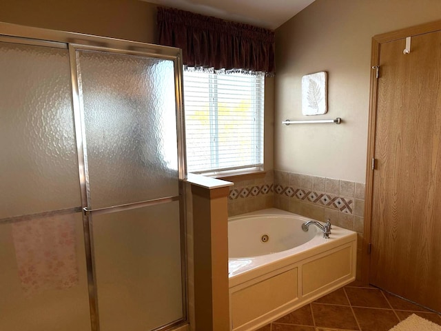 2115 Stafford Ct, Plainfield, IL 60586 - bathroom featuring tile patterned floors, a jetted tub, and a shower stall
