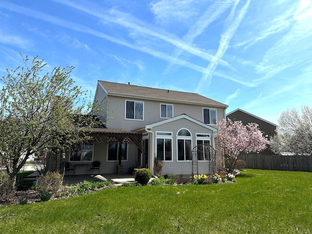 2115 Stafford Ct, Plainfield, IL 60586 - rear view of house with a lawn, a patio, and fence