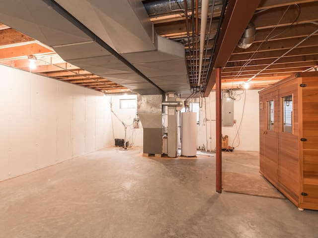 unfinished basement featuring water heater, heating unit, and electric panel