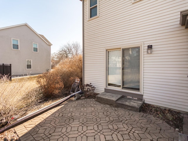 view of home's exterior with a patio area
