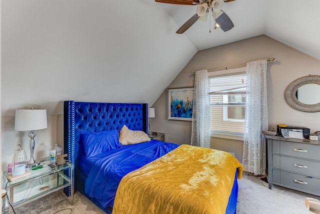 bedroom featuring lofted ceiling, carpet flooring, and ceiling fan