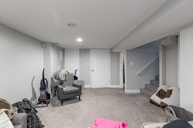 living area featuring stairway, carpet flooring, baseboards, and recessed lighting