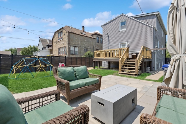 4825 W Ainslie St, Chicago, IL 60630 - fenced backyard with an outdoor hangout area, a patio area, a wooden deck, and stairway