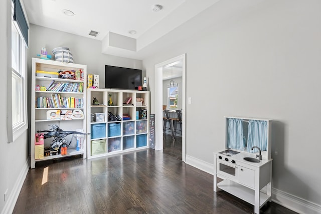 4825 W Ainslie St, Chicago, IL 60630 - sitting room with baseboards and wood finished floors