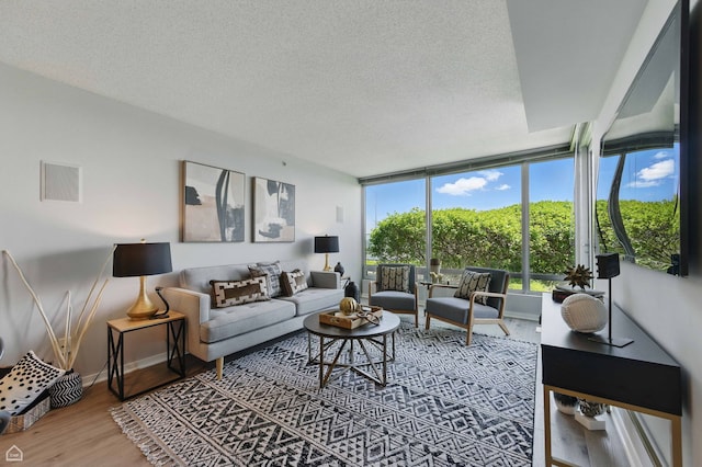 9715 Woods Dr Unit 805, Skokie, IL 60077 - living area featuring wood finished floors and a textured ceiling