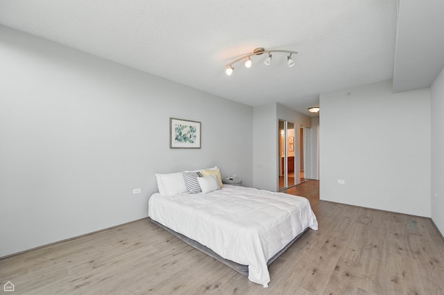 9715 Woods Dr Unit 805, Skokie, IL 60077 - bedroom featuring wood finished floors