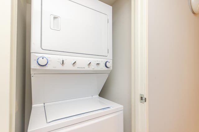 9715 Woods Dr Unit 805, Skokie, IL 60077 - laundry area with stacked washer / drying machine