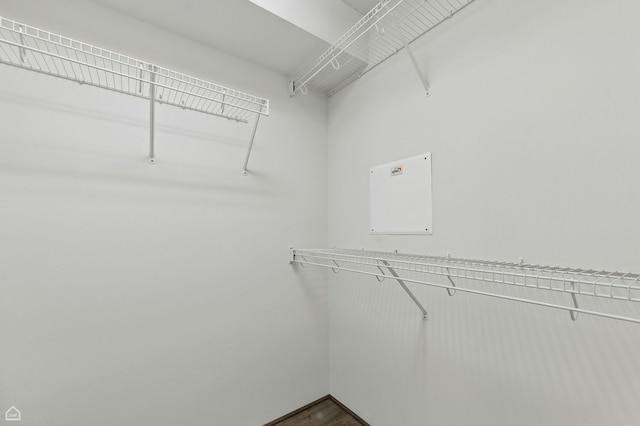 9715 Woods Dr Unit 805, Skokie, IL 60077 - spacious closet featuring dark wood-type flooring