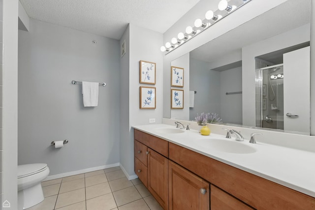 9715 Woods Dr Unit 805, Skokie, IL 60077 - full bath with tile patterned flooring, double vanity, a shower with door, and a textured ceiling