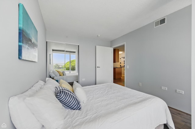 9715 Woods Dr Unit 805, Skokie, IL 60077 - bedroom featuring wood finished floors