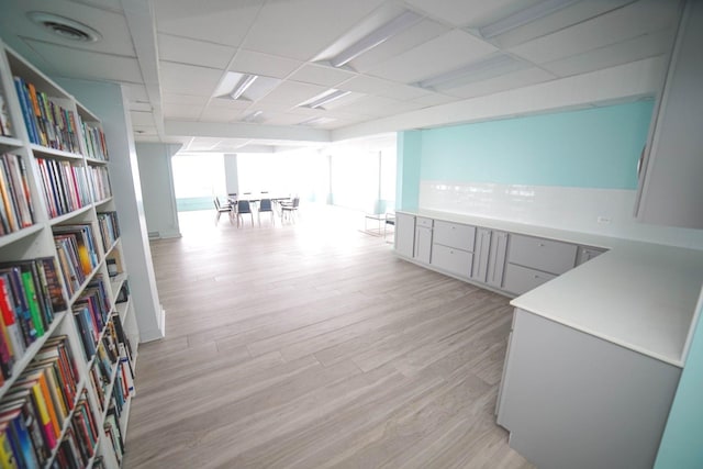6301 N Sheridan Rd Unit 6D, Chicago, IL 60660 - unfurnished office with visible vents, light wood finished floors, and a paneled ceiling