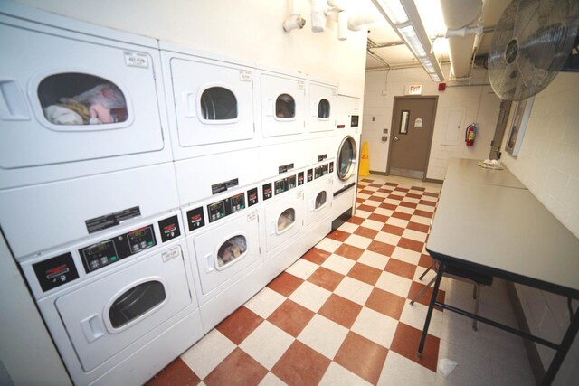 6301 N Sheridan Rd Unit 6D, Chicago, IL 60660 - shared laundry area with light floors, stacked washer / drying machine, and washing machine and dryer