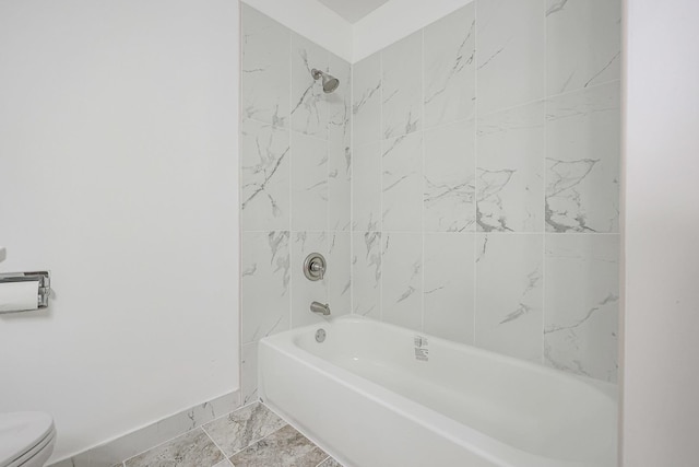 full bath with shower / washtub combination, baseboards, marble finish floor, and toilet