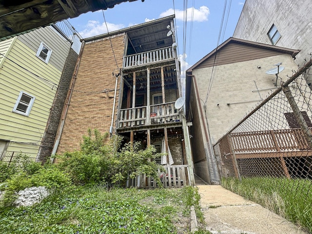 1633 W N Ave, Chicago, IL 60622 - back of house featuring brick siding and a balcony
