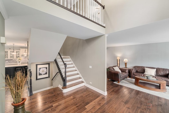 357 Torrey Pines Way, Vernon Hills, IL 60061 - living area featuring wood finished floors, stairs, baseboards, and a towering ceiling