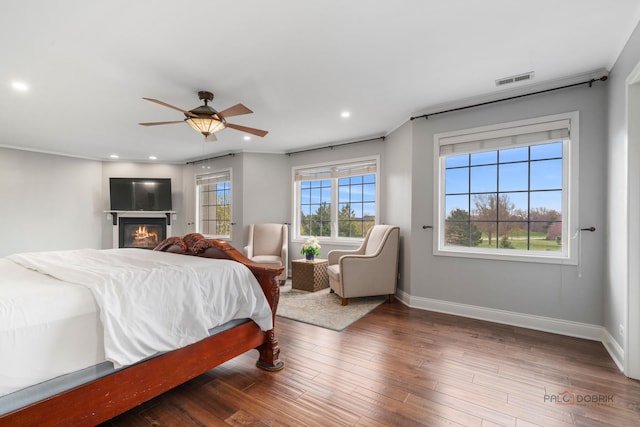 357 Torrey Pines Way, Vernon Hills, IL 60061 - bedroom featuring baseboards, a lit fireplace, recessed lighting, crown molding, and wood finished floors